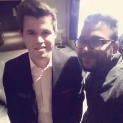 Best Chess Coaching Classes - chess master arjun with Magnus Carlsen chess grandmaster